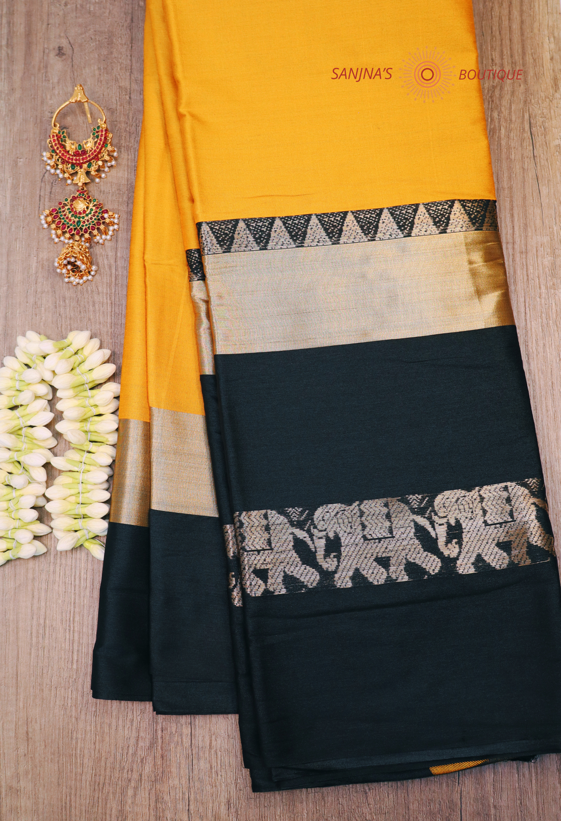 The Colza Silk Saree with aari work blouse