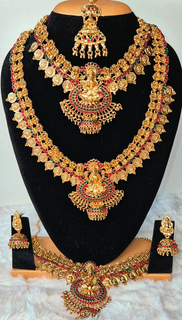 Divine Bridal Grandeur – Complete Golden Set with Red & Green Stones